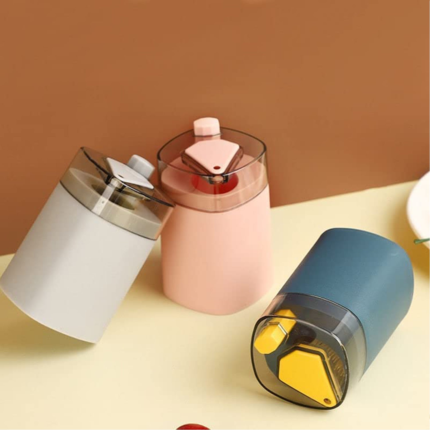 Wukusy 4005L automatic toothpick dispenser with pop-up design, compact safe container for kitchen or restaurant toothpick storage.