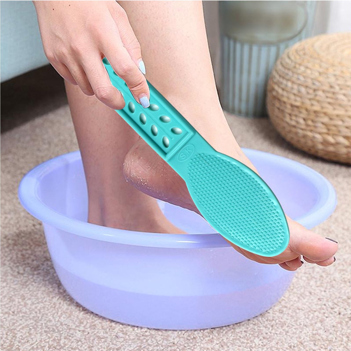 Wukusy plastic foot scrubber for pedicure and foot care, featuring textured surface for exfoliating and cleaning feet.
