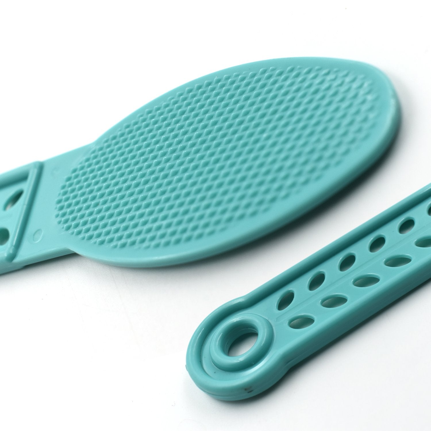 Wukusy Plastic Foot Scrubber for pedicure and foot care, showing textured surface for exfoliating and cleansing feet.
