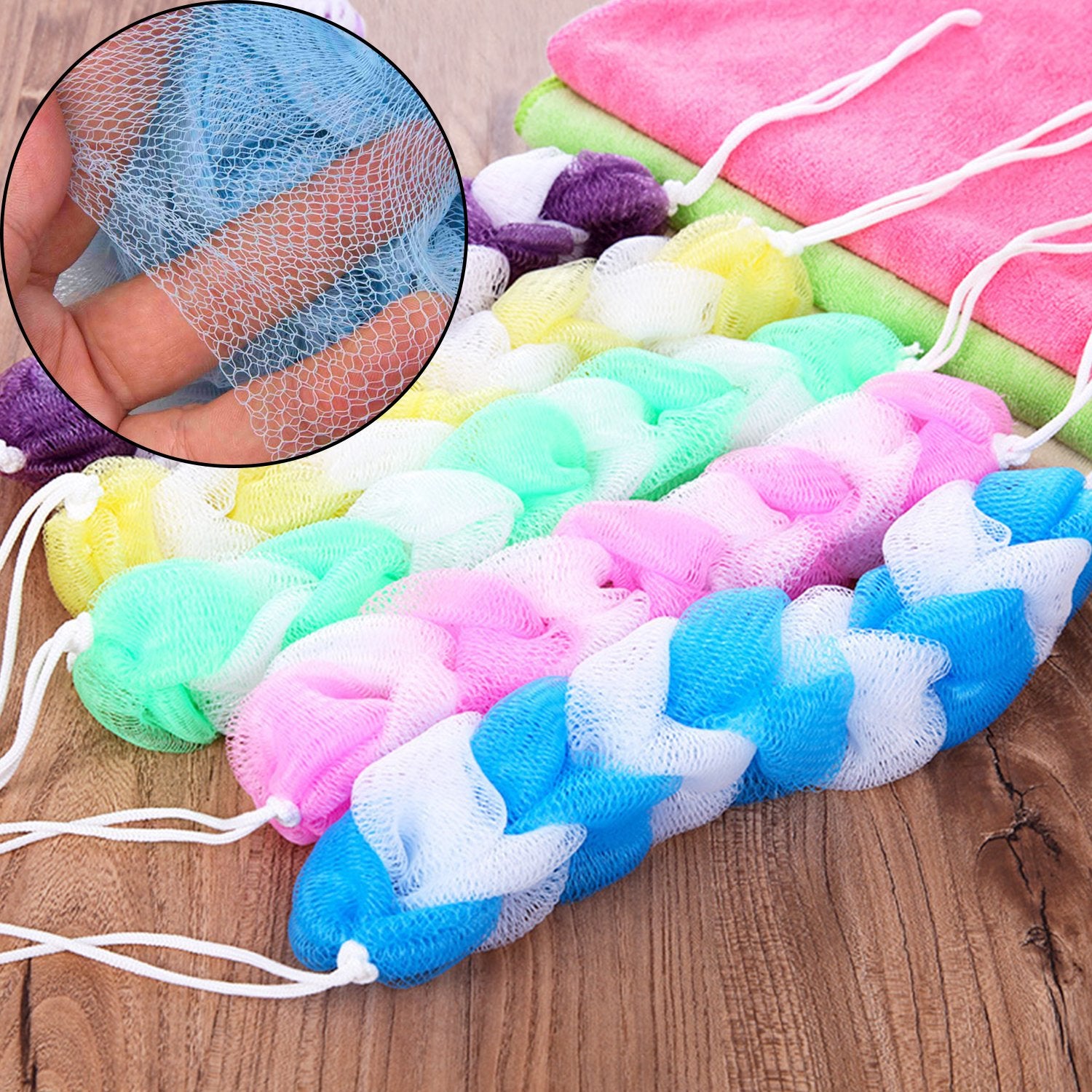 Six small Wukusy hanging bath shower loofah sponges, long pouf body scrubbers for exfoliating in the shower.