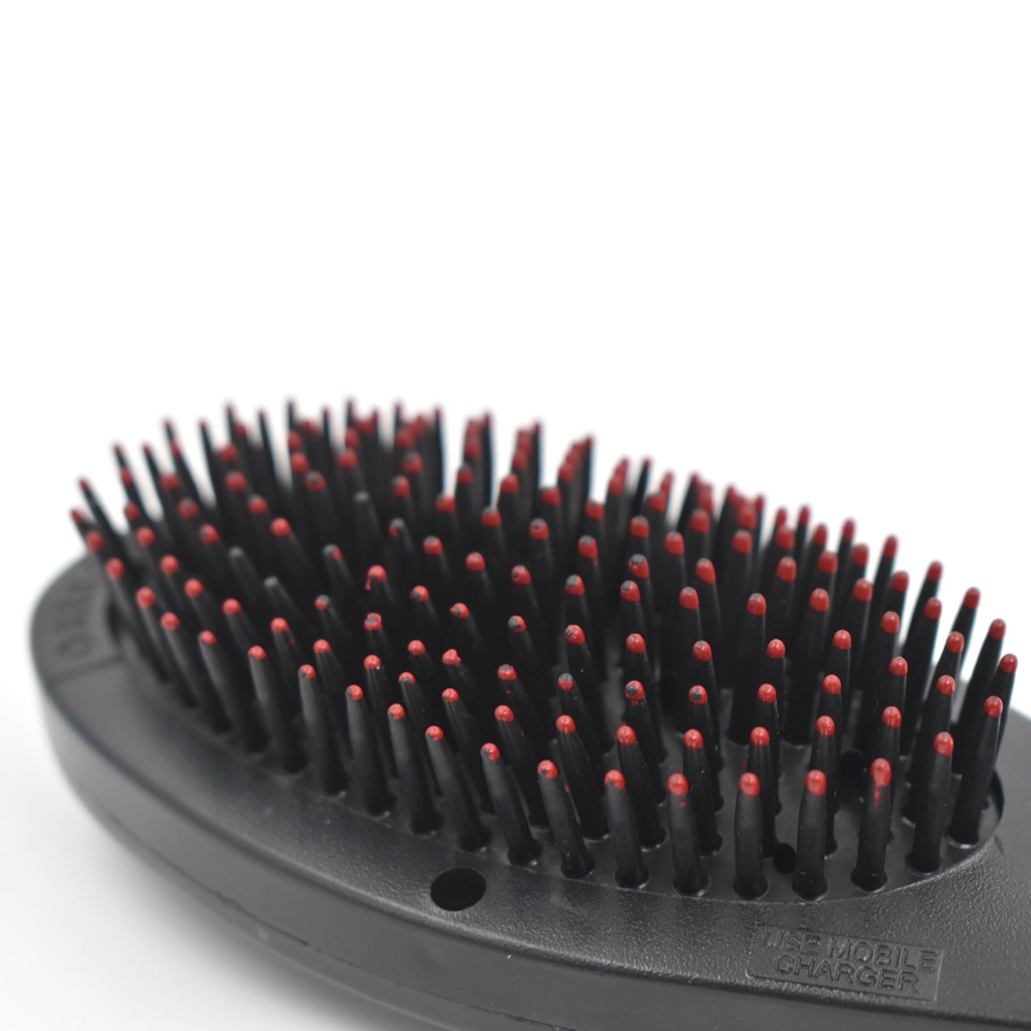 Wukusy Electric Vibrating Massager Comb for hair, designed to stimulate scalp and improve hair health with gentle vibrations.