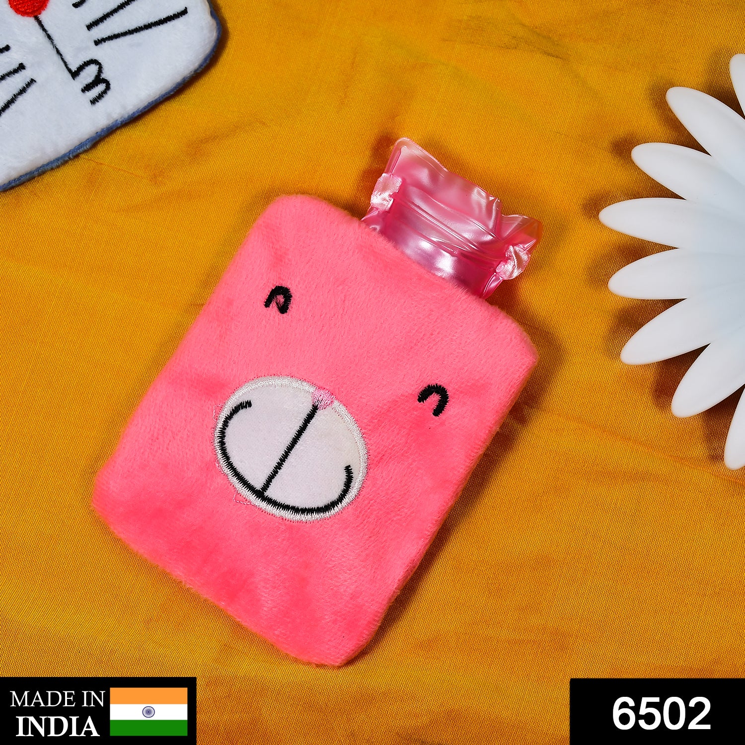 Pink Wukusy small hot water bag with cover for pain relief, neck, shoulder, hand, feet warming, and menstrual cramp relief.
