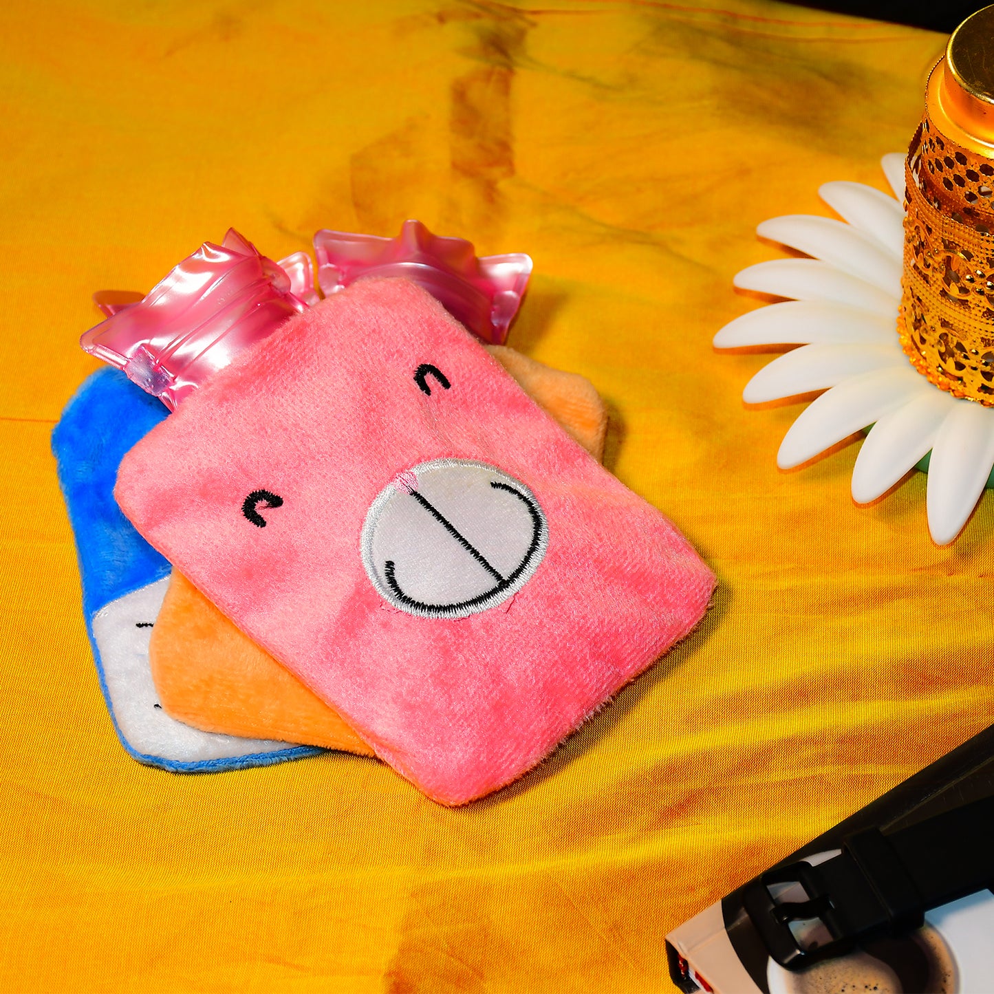 Pink Wukusy small hot water bag with cover, used for neck, shoulder pain relief, menstrual cramps, and hand or foot warming.