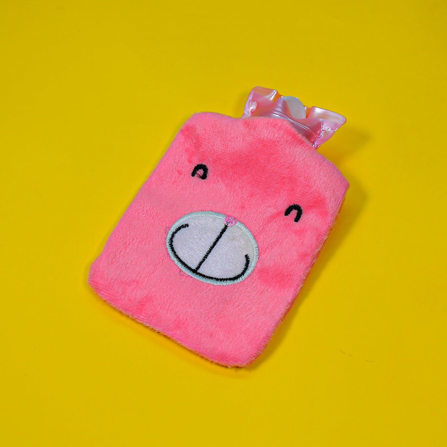 Pink Wukusy small hot water bag with cover, used for pain relief, neck and shoulder soothing, and menstrual cramps.