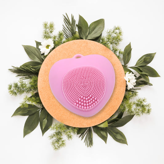 Wukusy waterproof silicone face wash brush with heart shape, exfoliating facial scrubber for deep skin cleansing, suitable for women at home.