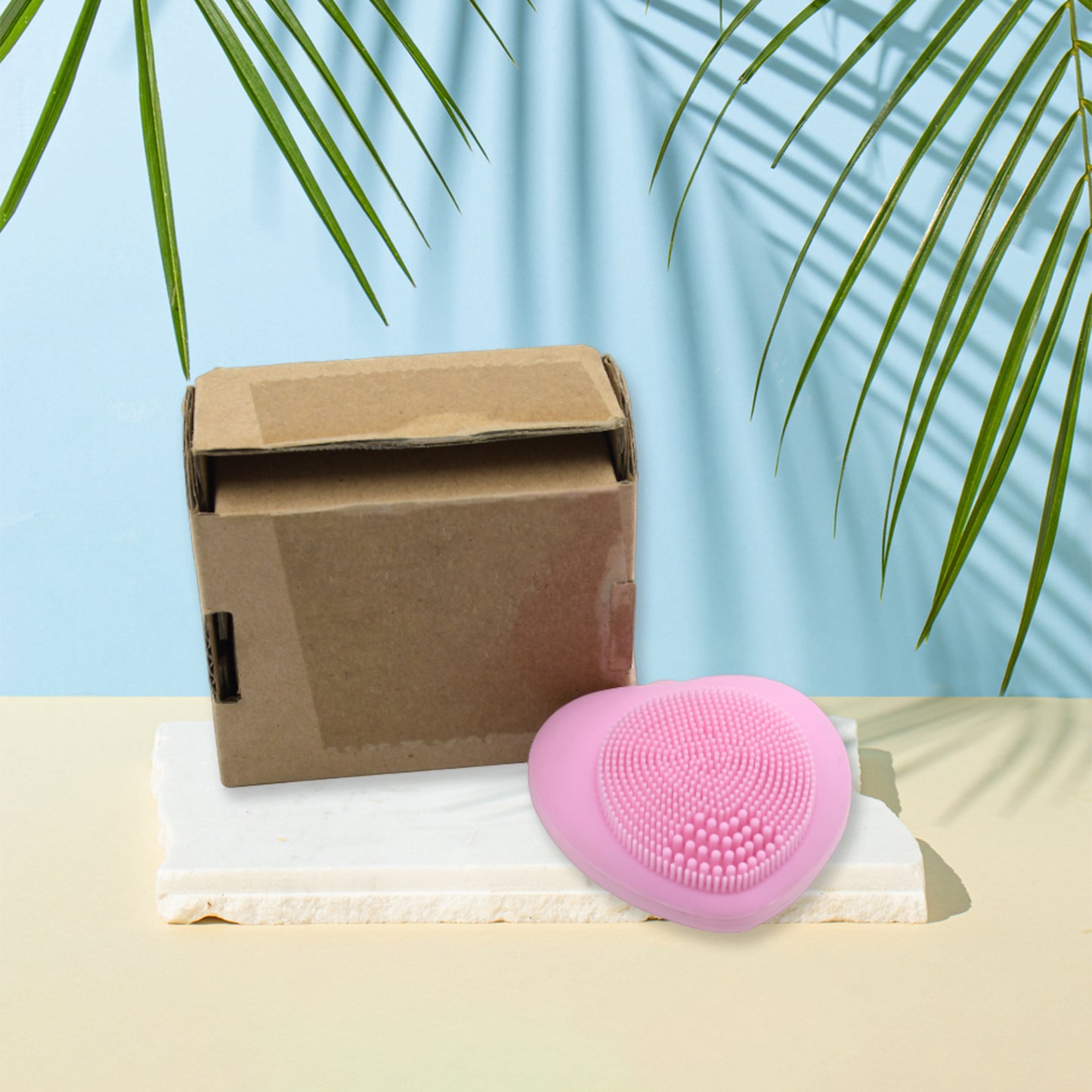 Wukusy waterproof silicone facial cleansing brush with heart shape, exfoliating surface, for deep skin cleansing and hot compress use.
