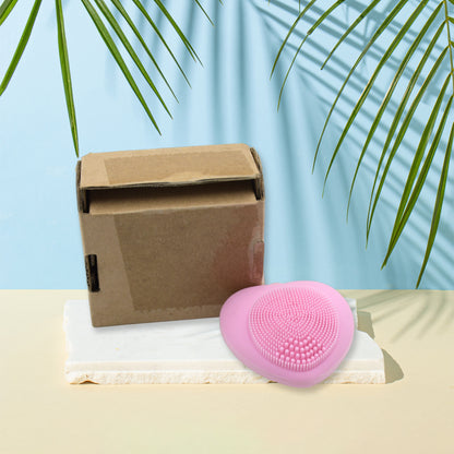 Wukusy waterproof silicone facial cleansing brush with heart shape, exfoliating surface, for deep skin cleansing and hot compress use.