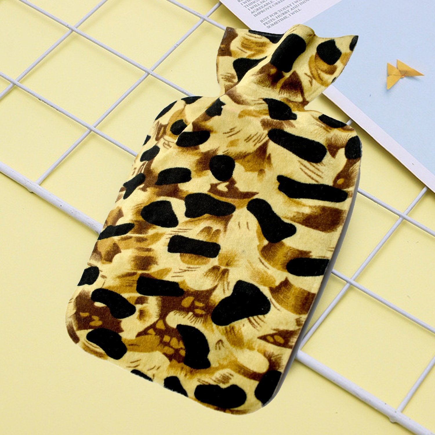 Large Wukusy rubber hot water heating pad for pain relief, shown filled and ready for use in personal care and health therapy.
