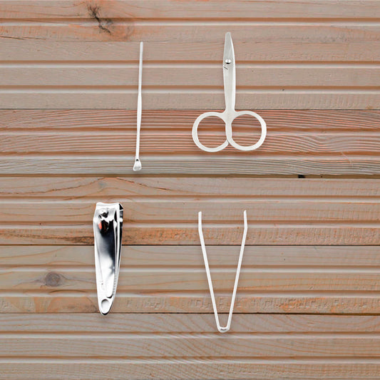 Wukusy 4-piece mini nail clipper set with plastic storage case, including nail scissors, file, and clippers for beauty and grooming.