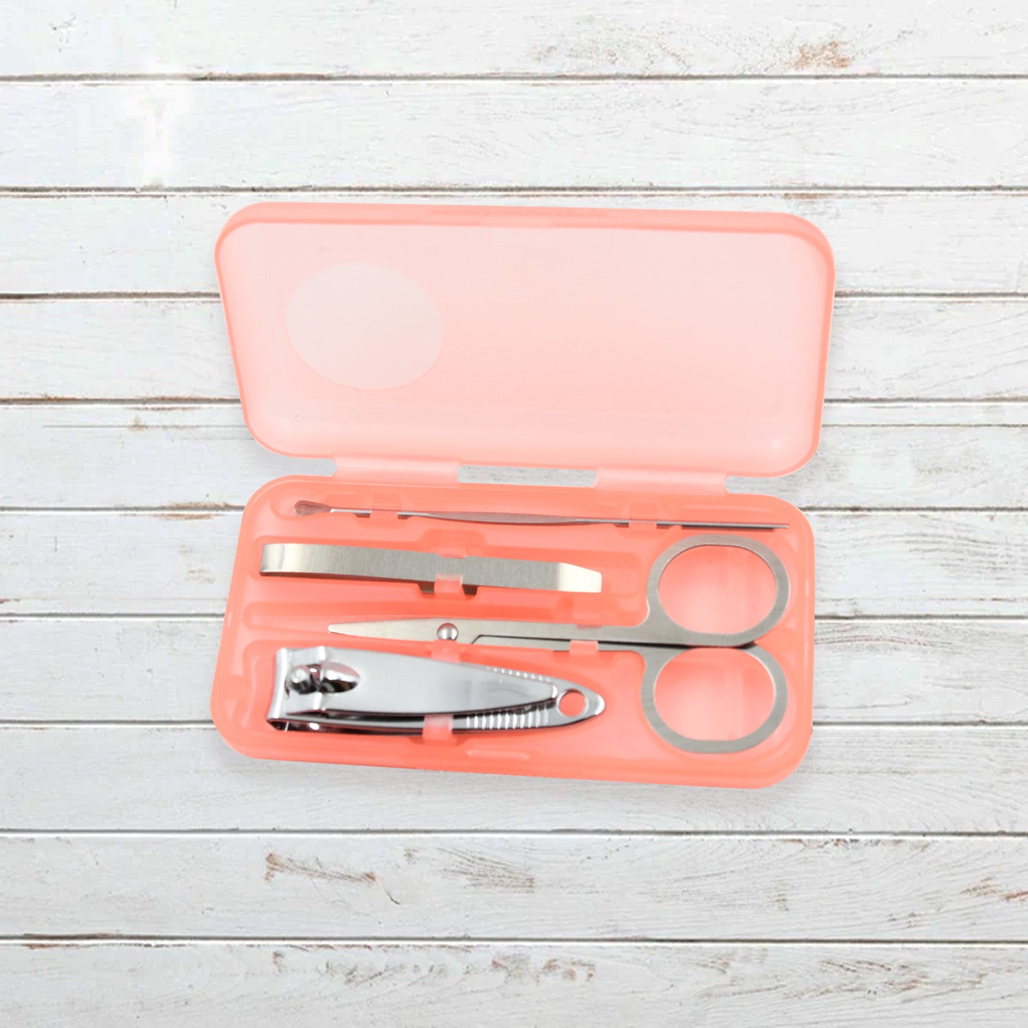 Wukusy mini nail clipper set with four beauty nail tools in a plastic storage case, compact health and beauty grooming kit.