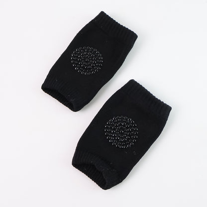 Black toddler wool knit leg warmer and knee guard from Wukusy, designed for comfort and warmth in health and beauty.