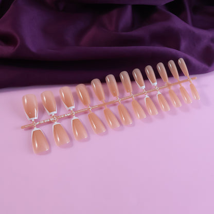 Wukusy elegant nude glossy artificial nail tips set with 24 fake nails, perfect for beauty and nail art applications.