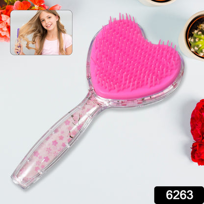 Heart-shaped hair brush and massage shower comb by Wukusy, designed for gentle detangling and scalp massage.