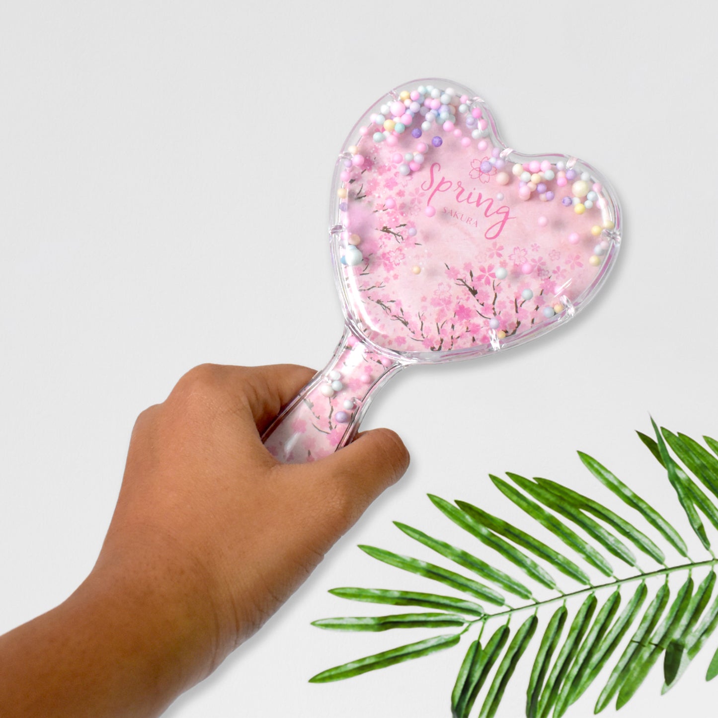 Wukusy heart-shaped hair brush massage shower comb for gentle scalp and hair detangling, made of smooth plastic.