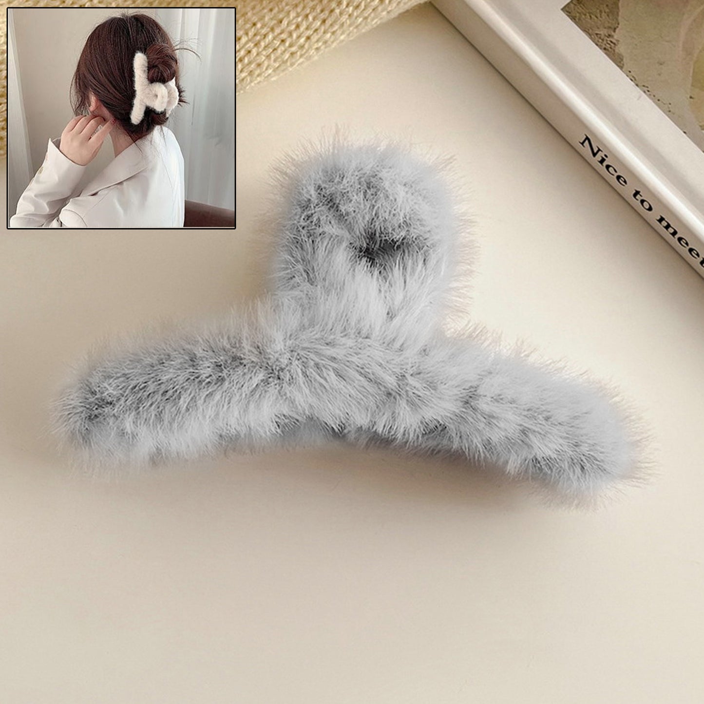 Large plush plastic hair claw clip by Wukusy in mixed colors, fluffy and sturdy for securing hair comfortably.