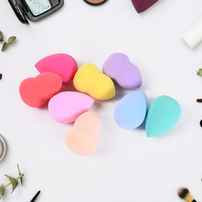 Set of 8 Wukusy makeup beauty powder puffs with colorful cases for smooth application and blending in health and beauty routine.
