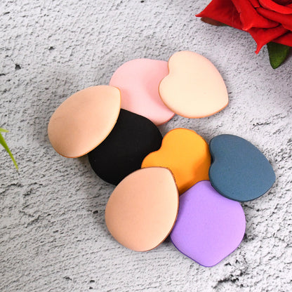 Set of 8 multicolour mini finger makeup powder puffs from Wukusy, perfect for applying face powders and blending makeup.