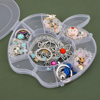Plastic apple-shaped jewelry storage box by Wukusy, compact health and beauty accessory for organizing rings and earrings.