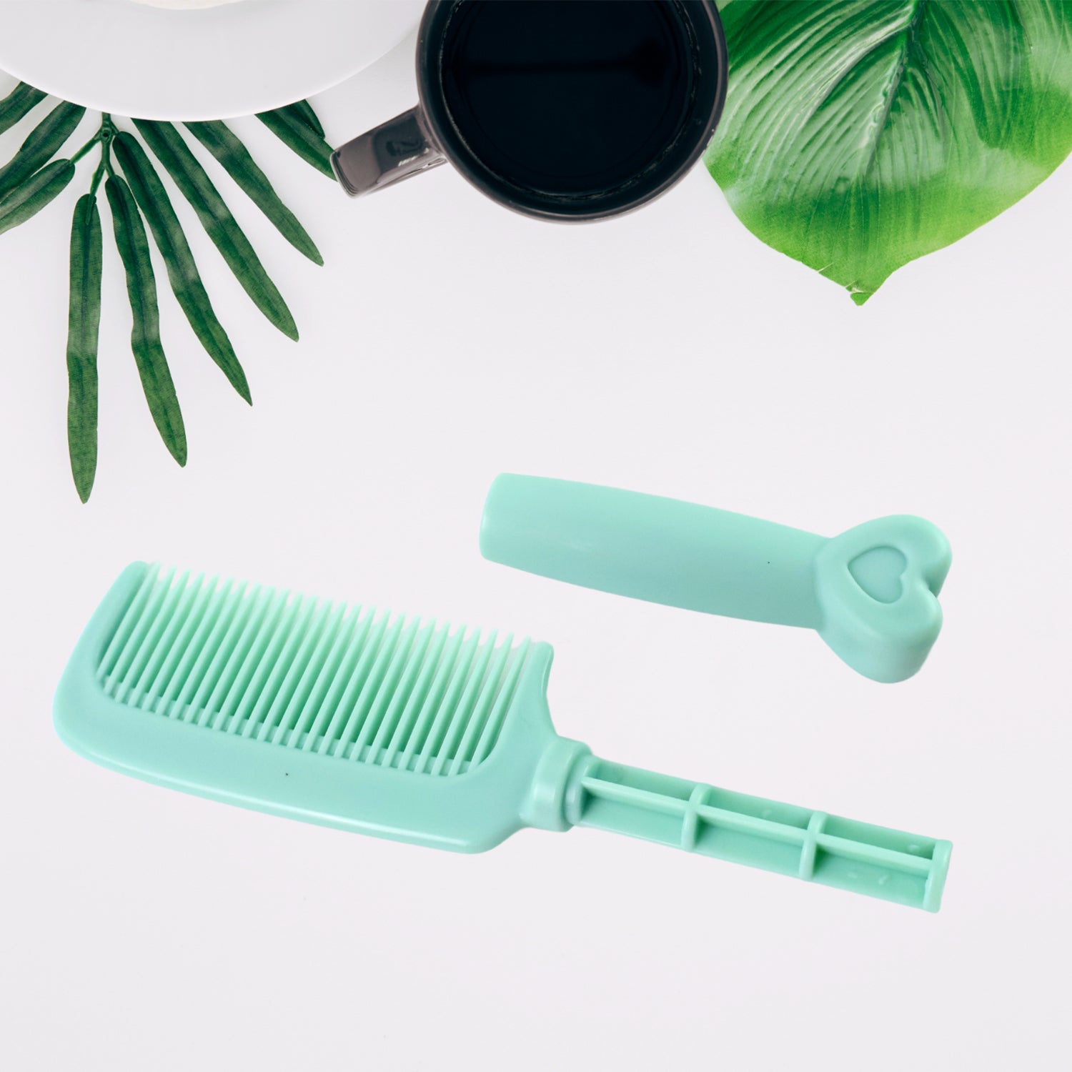 Plastic hair comb with a heart-shaped handle from Wukusy, designed for gentle hair detangling and styling.
