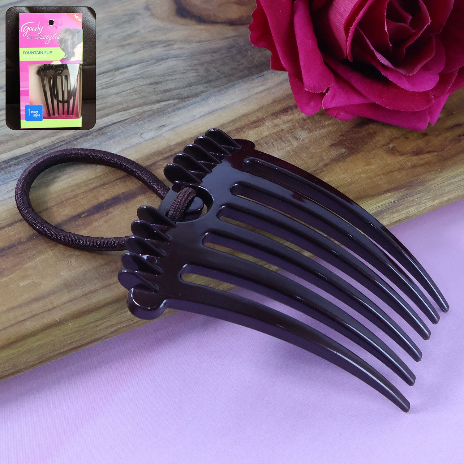 Wukusy ponytail comb with elastic loop for secure hair styling, shown with black plastic construction and a comfortable grip.