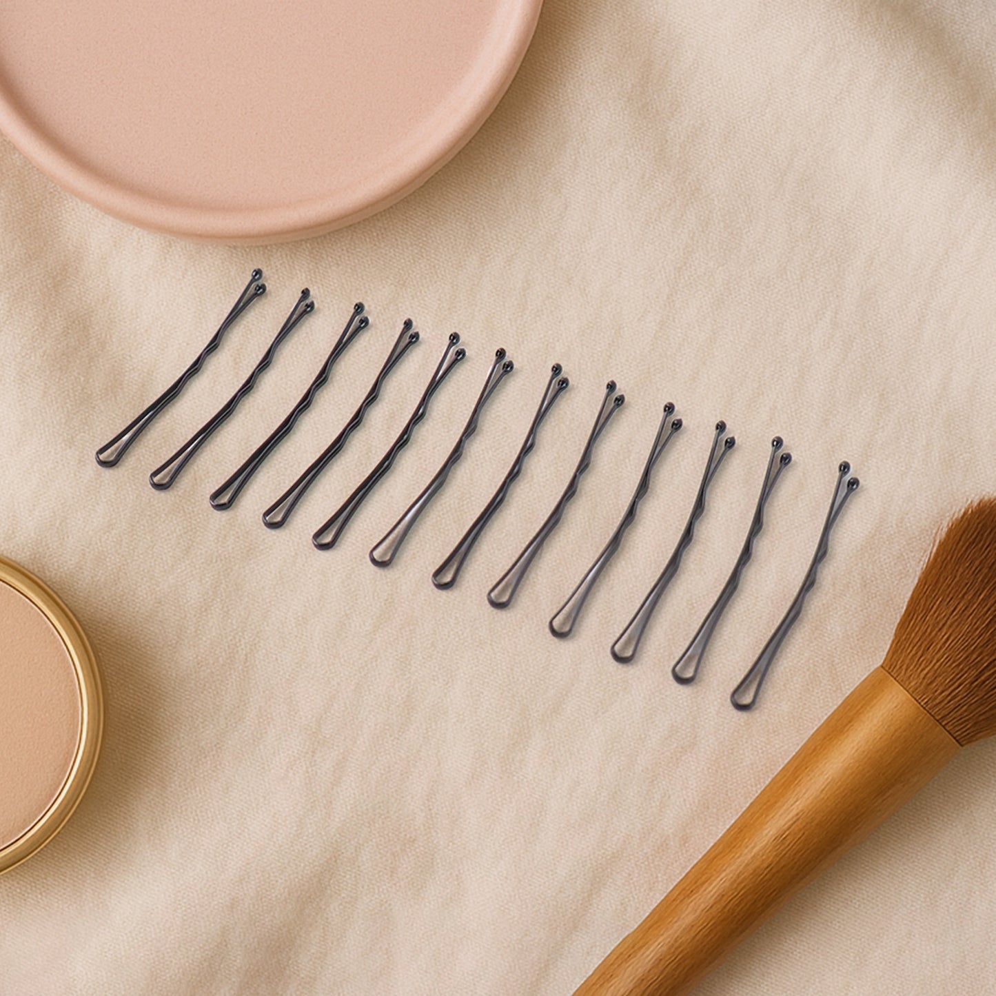 Wukusy Premium Hair Bobby Pins Set with 12 durable, metal hairpins for styling and securing hair.