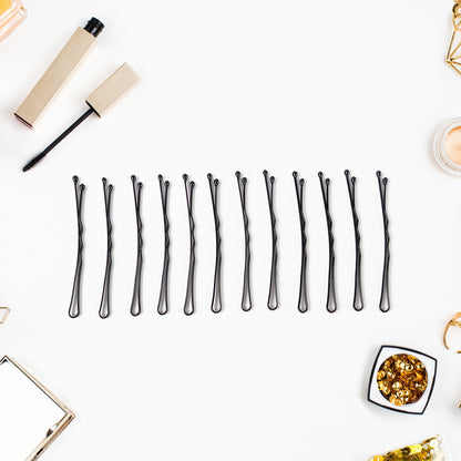 Set of 12 Wukusy premium hair bobby pins for secure hairstyling in a sleek, professional design.