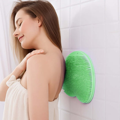 Purple silicone bath massage cushion with suction cups and exfoliating foot scrubber mat for relaxing health and beauty routines.
