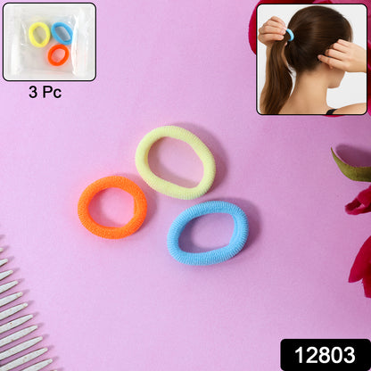 Set of three Wukusy seamless soft hair elastics, gentle and stretchy for secure, comfortable hair styling.
