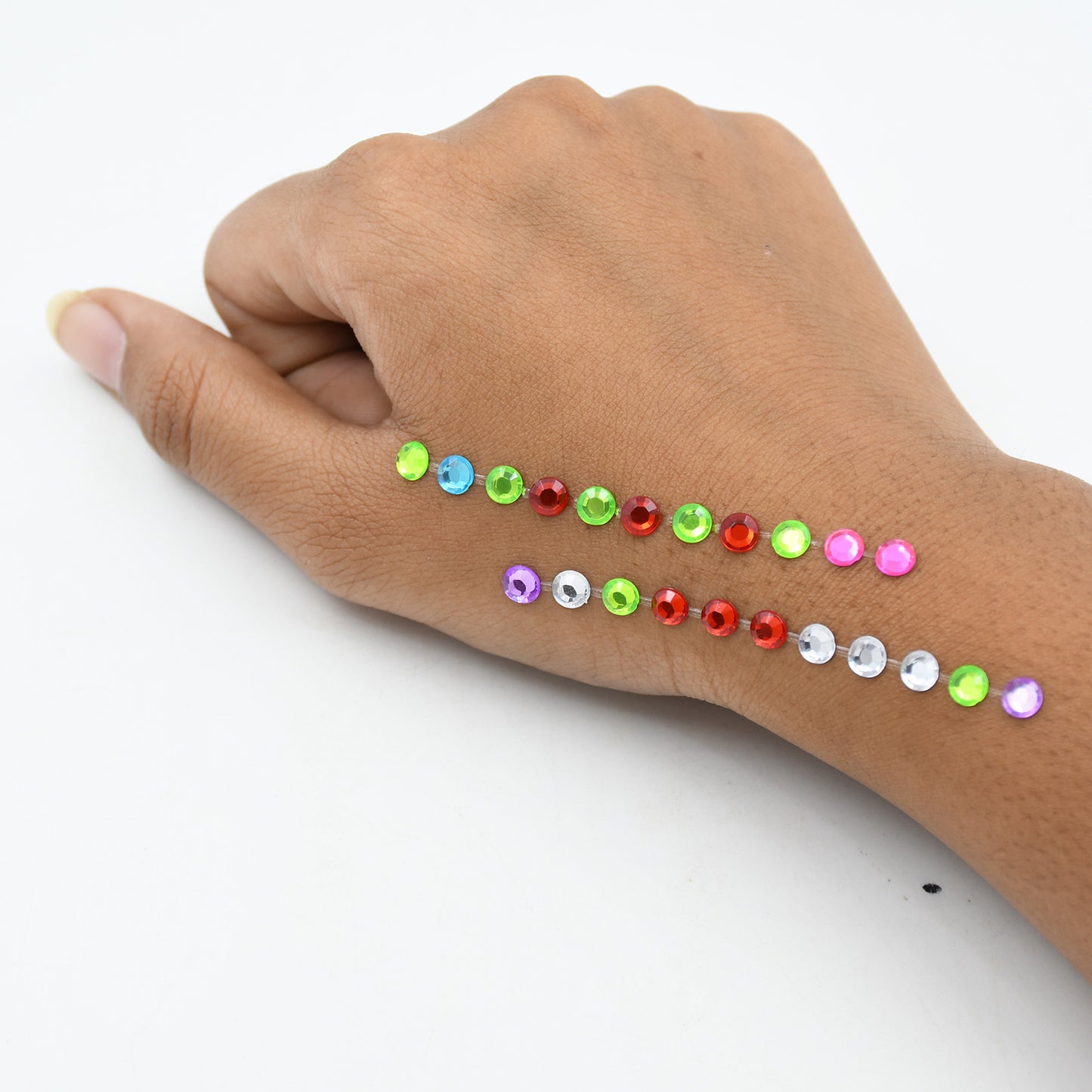 Wukusy self-adhesive shining crystal stones in various shapes and sizes for art, craft, jewelry making, and mobile phone decoration.