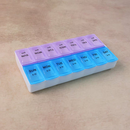 Wukusy weekly medicine pill organizer with seven compartments for daily medication management.