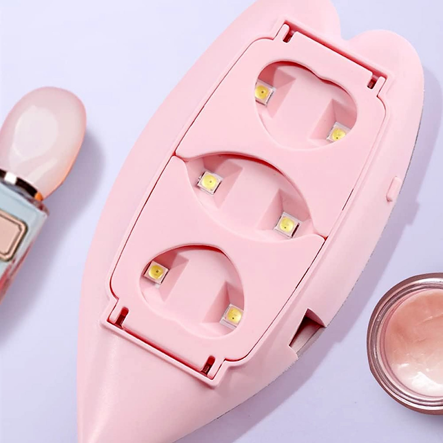 Wukusy Mini Nail Lamp with 6W UV LED lights, USB cable, for gel nail polish, nail art, home DIY, and professional manicures.