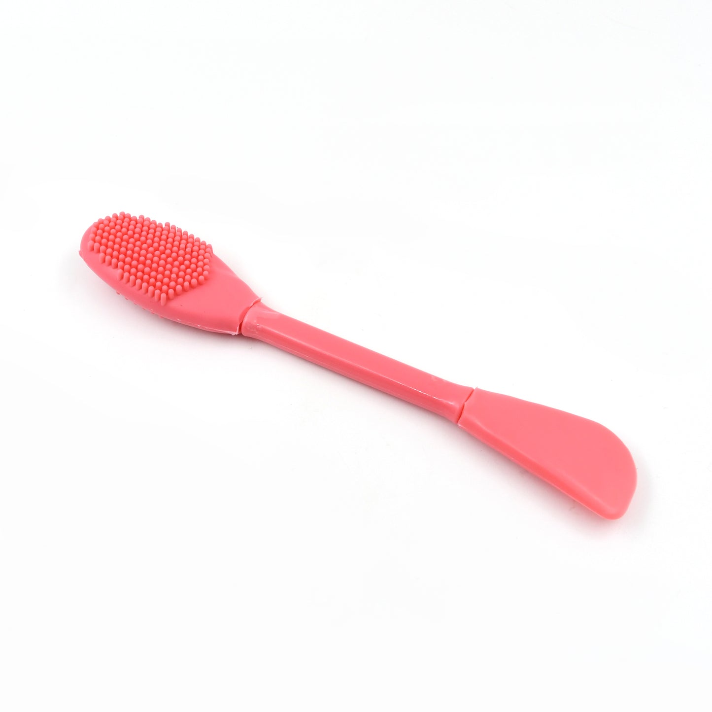 Wukusy 2-in-1 double-headed silicone face mask brush for applying skincare masks, with soft silicone bristles and ergonomic handle.