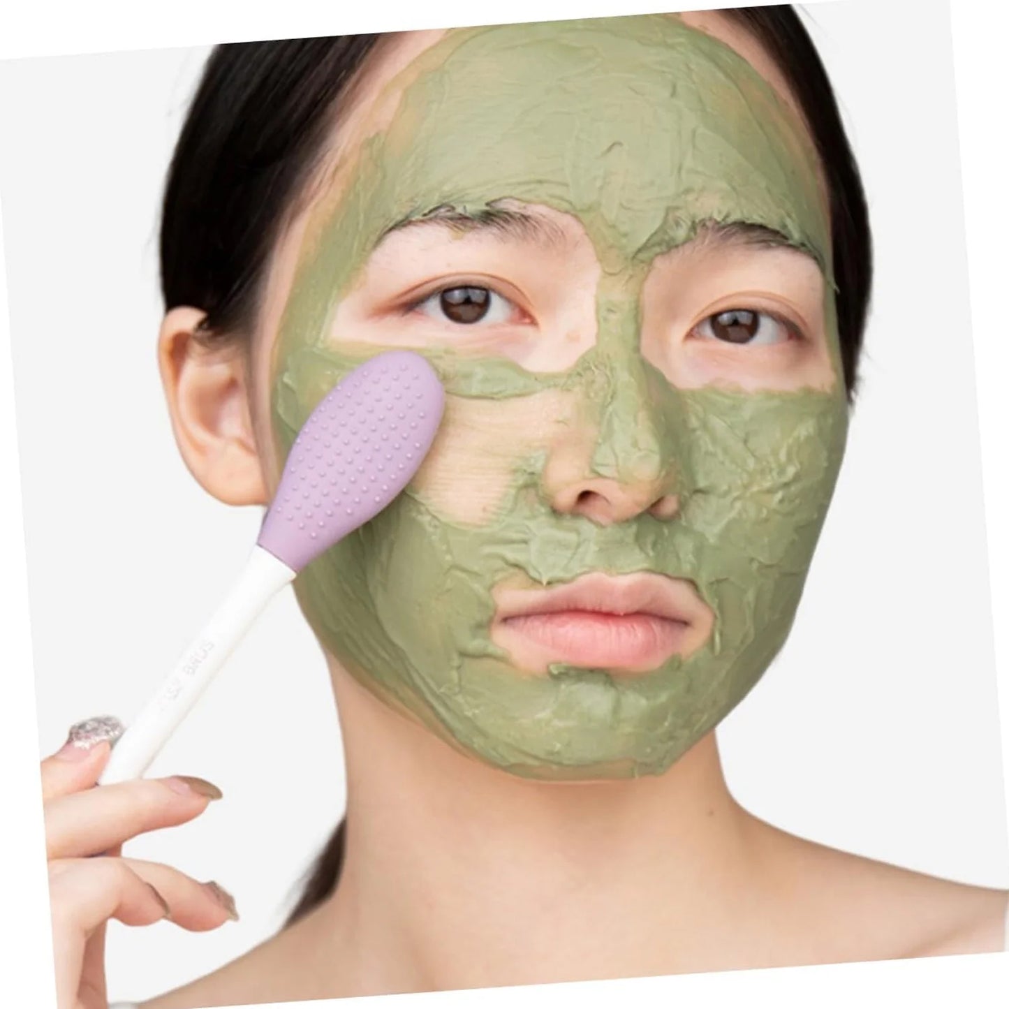 Wukusy 2-in-1 double-headed silicone face mask brush for applying skincare masks, health care tool with ergonomic design.
