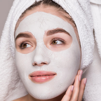 Wukusy 2-in-1 double-headed silicone face mask brush for skincare, showing soft silicone bristles and ergonomic handle.