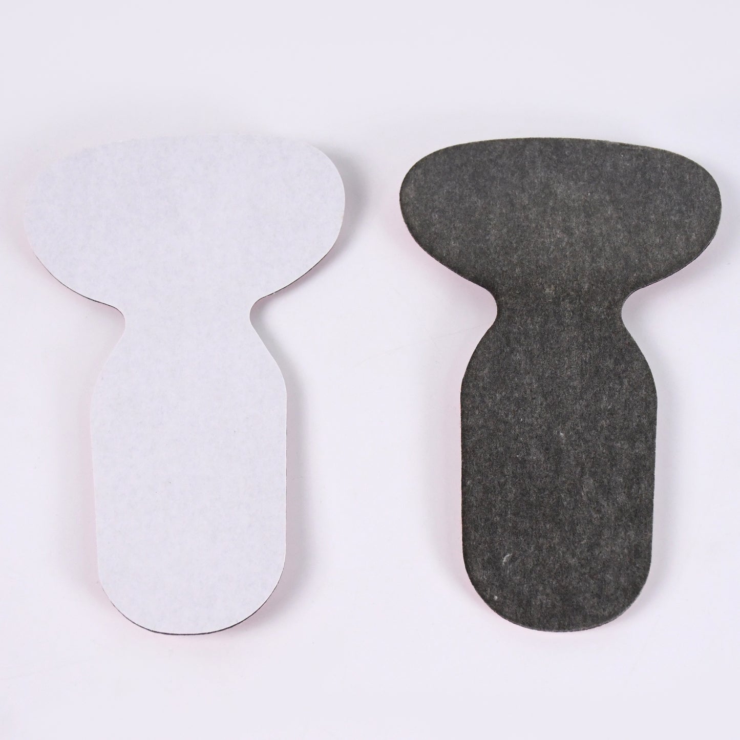 Pair of Wukusy 2-in-1 T-shaped silicone self-adhesive shoe heel pads insoles for comfort and heel support.