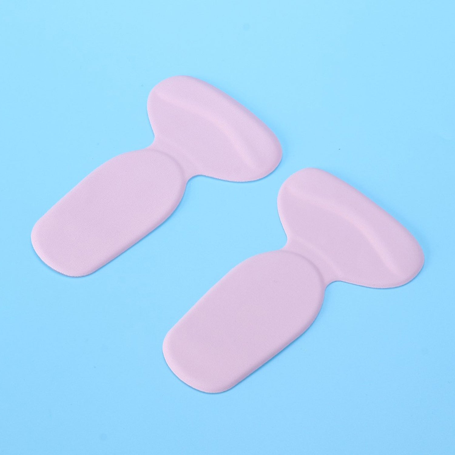 Wukusy 2-in-1 T-shaped silicone self-adhesive shoe heel pads insoles, pair, for added comfort and heel support.