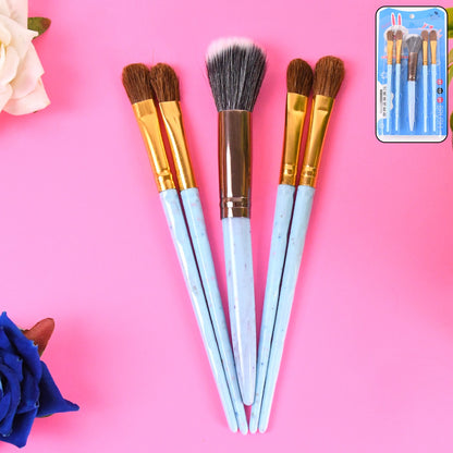 Wukusy 5-piece makeup brush tools kit with mixed color handles, including foundation, blush, and eyeshadow brushes.