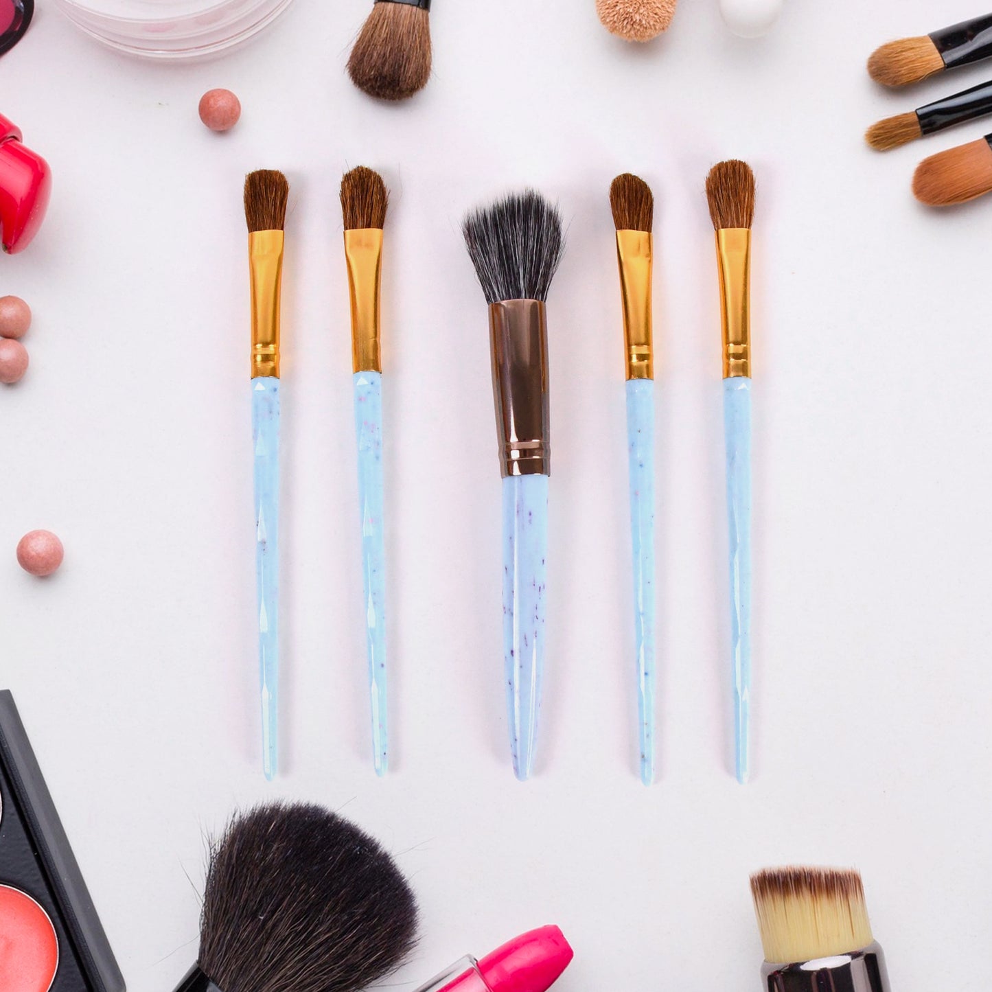 Wukusy 5-piece makeup brush tools kit with mixed color handles, includes various brushes for applying makeup and skincare.