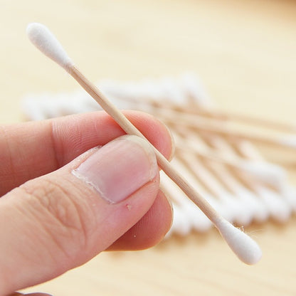 Wukusy bamboo cotton swabs with wooden handles, double-head design for makeup, ear, and wound cleaning, eco-friendly pack of 20.