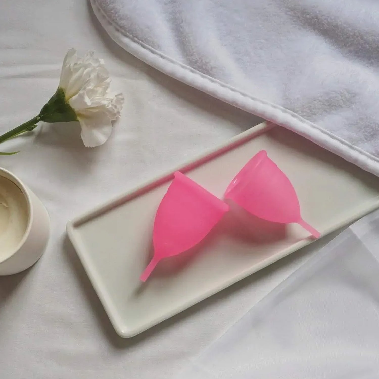 Wukusy reusable menstrual cup for women and girls, soft silicone health care product used during menstrual cycle.