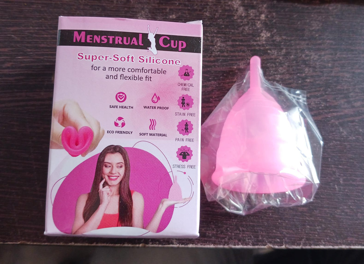 Wukusy reusable menstrual cup for women and girls, used during menstrual cycle, made of soft silicone for comfortable hygiene.