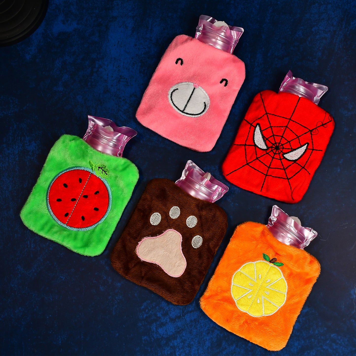 Wukusy 6501 Mini Hot Water Bag for pain relief, with a colorful mix design, used for soothing aches and muscle pain.