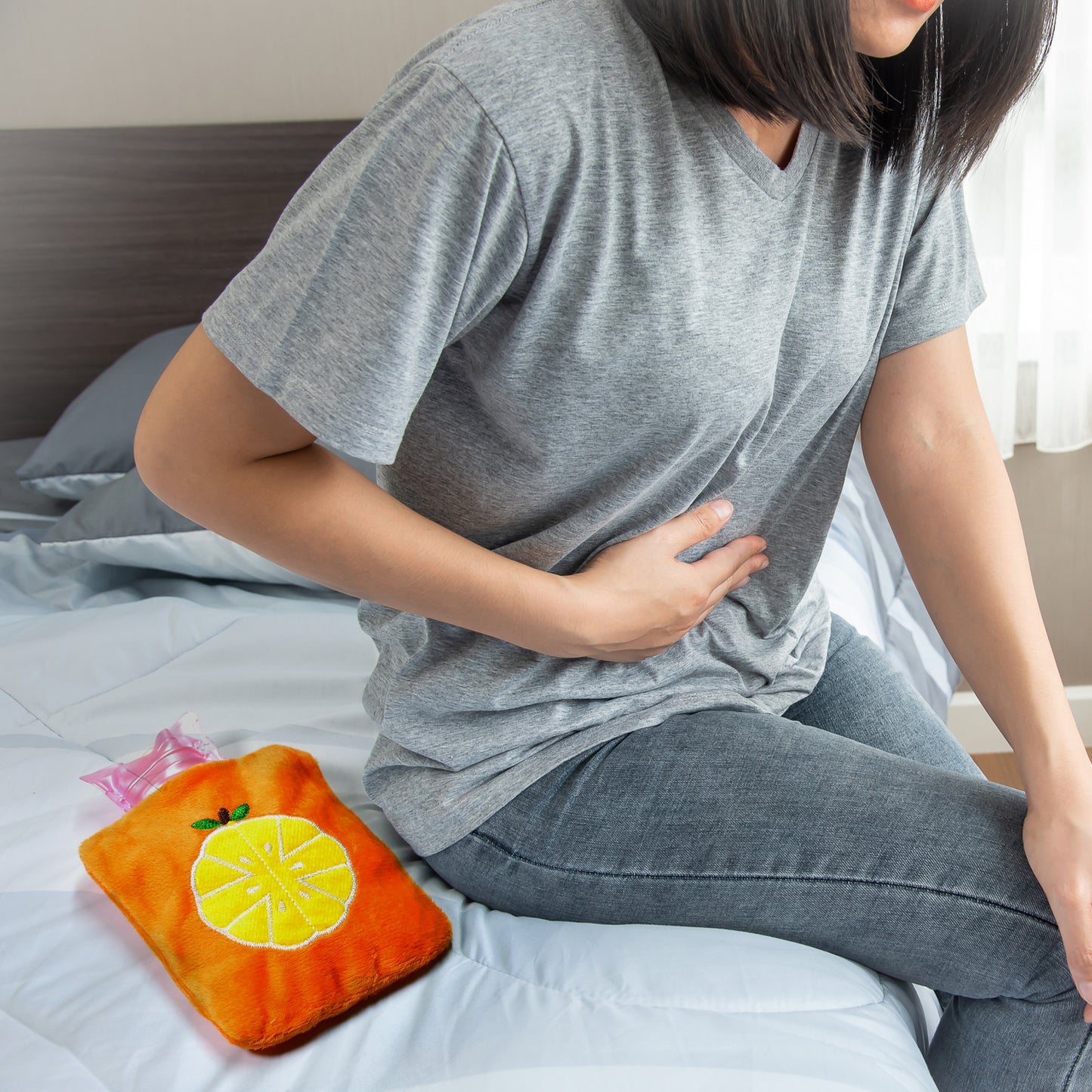 Wukusy orange small hot water bag with cover for pain relief, neck, shoulder, hand, feet warmer, and menstrual cramps.
