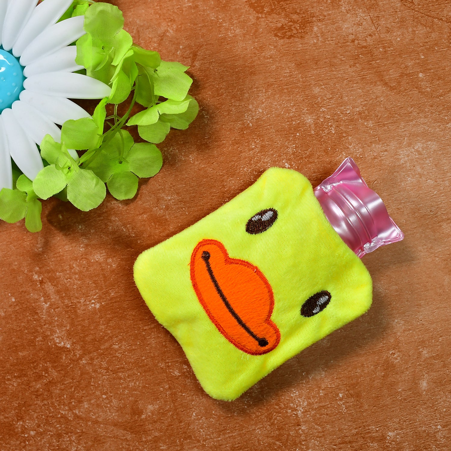 Yellow duck-shaped hot water bag with cover, ideal for pain relief, neck, shoulder, hand, feet warming, and menstrual cramps by Wukusy.