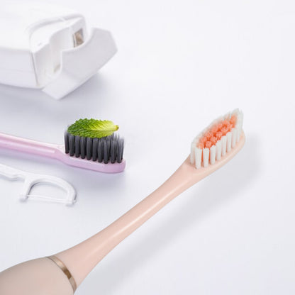 Wukusy electric toothbrush for adults and teens with deep cleansing bristles and extra brush heads for oral health care.