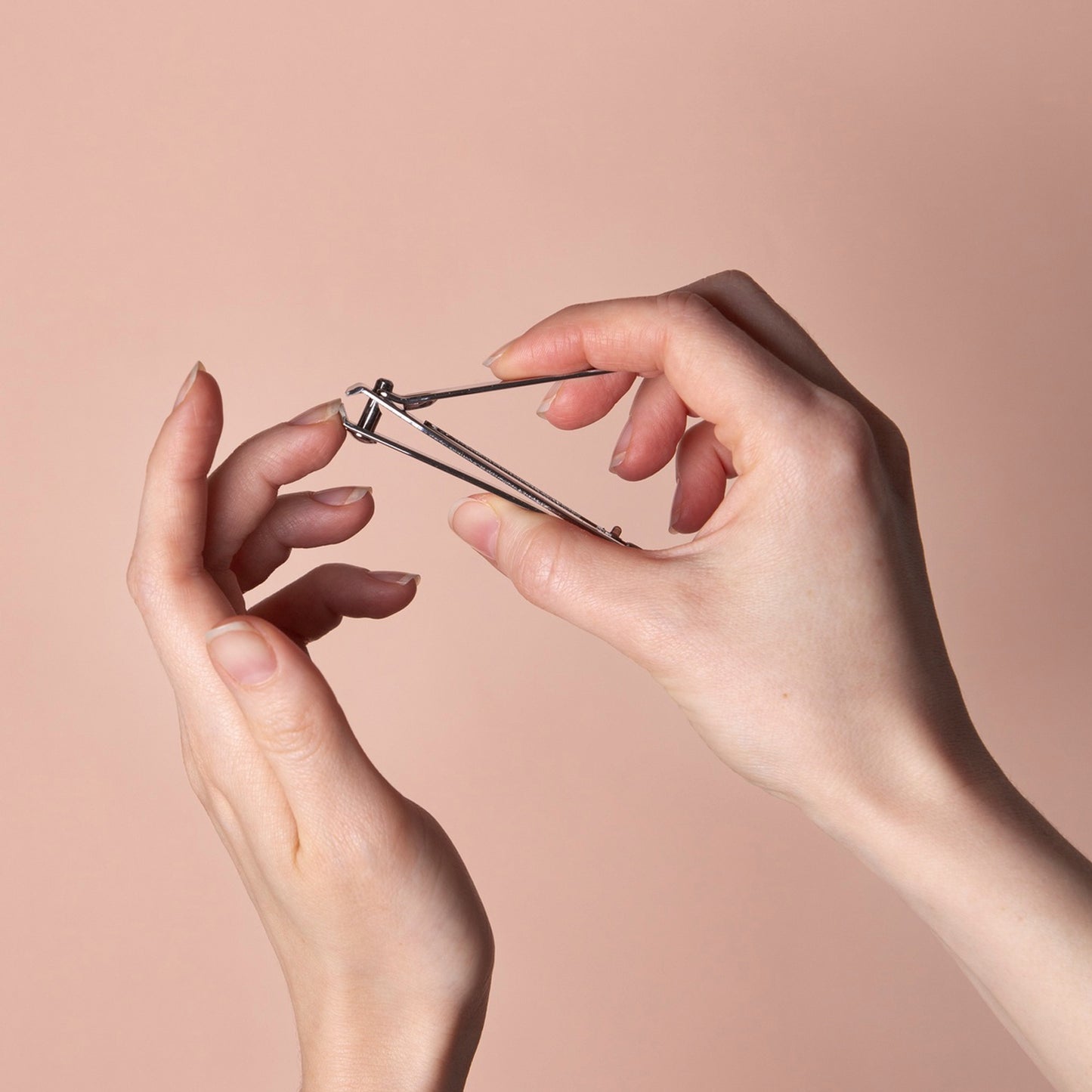 Wukusy 8-in-1 manicure set with various health care tools including nail clippers, scissors, and files in a compact kit.