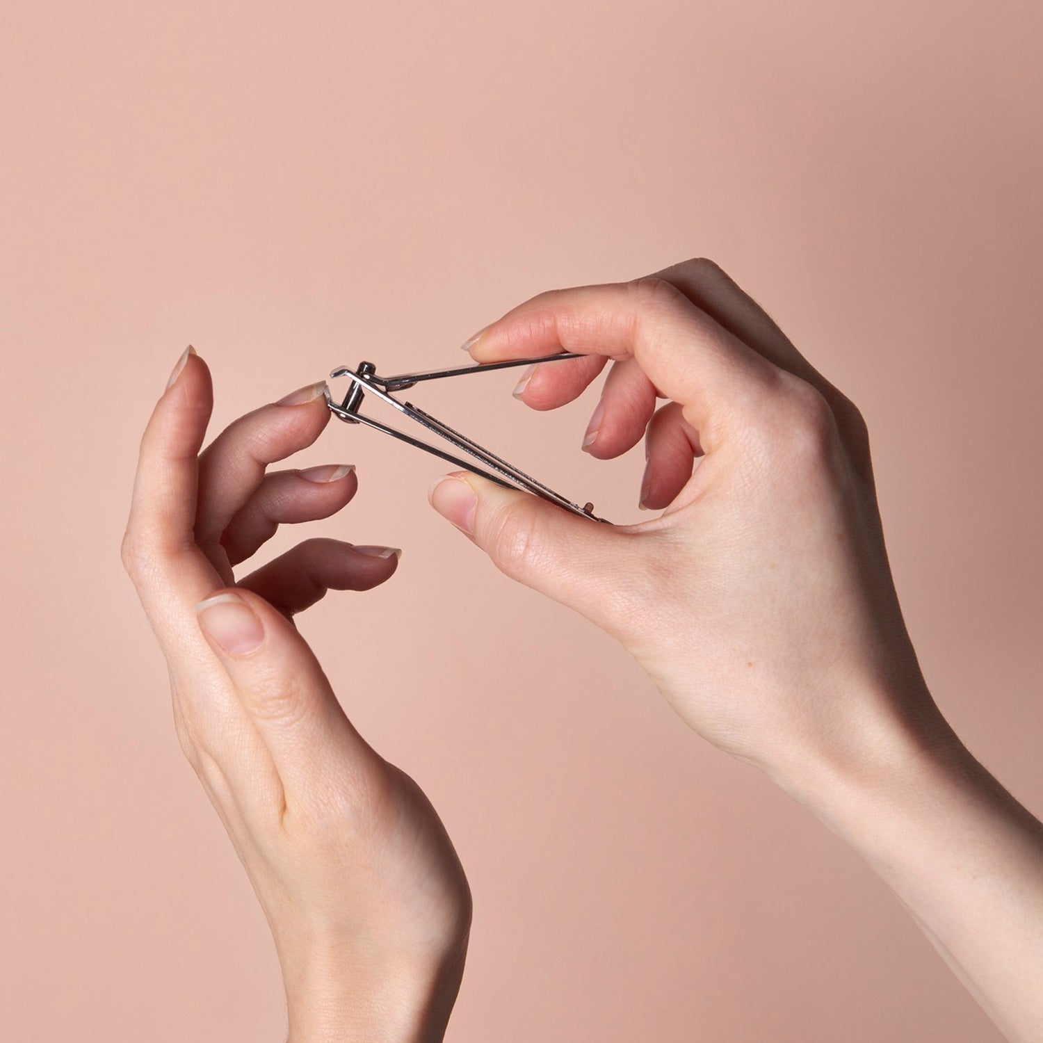 Wukusy 8-in-1 manicure set with various health care tools including nail clippers, scissors, and files in a compact kit.