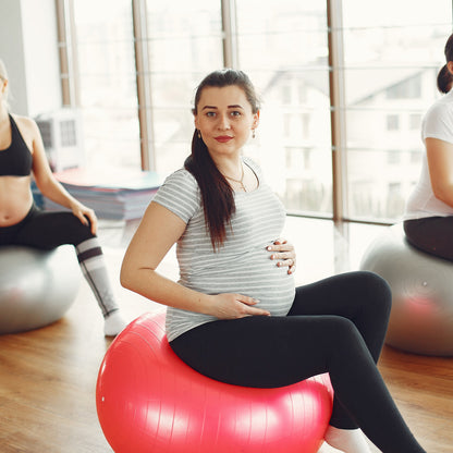 Wukusy 65cm anti-burst exercise ball with pump, non-slip surface, used for yoga, Pilates, core training at home or gym.