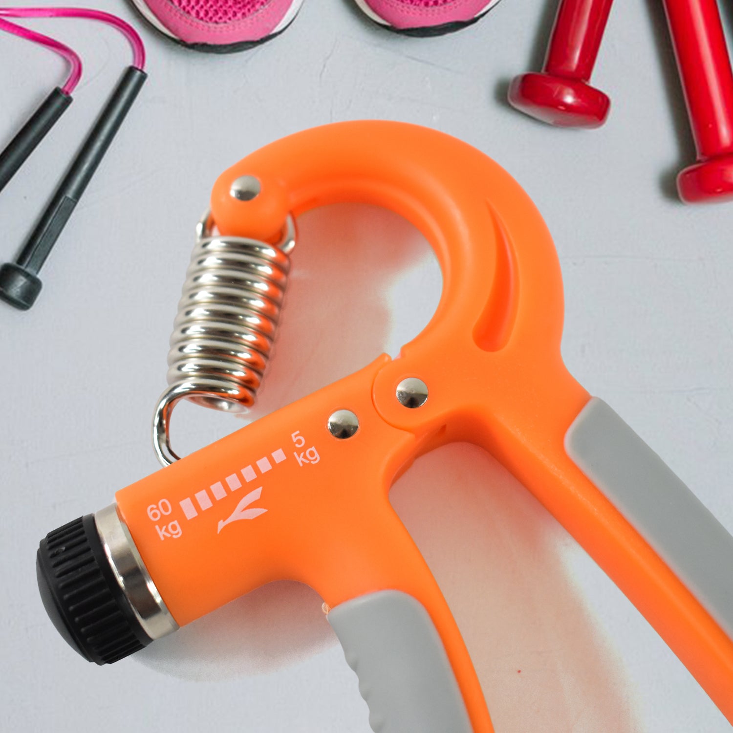 Wukusy adjustable hand grip strengthener with 5kg to 60kg resistance for improving hand and finger strength.