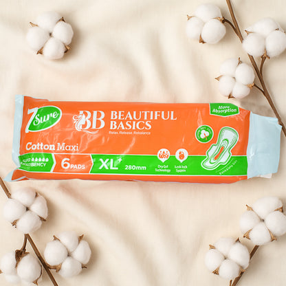 Six Wukusy Beautiful Basics orange cotton maxi sanitary pads, XL+ 280mm, in a pack for health care and feminine hygiene.